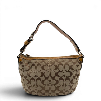 https://cdn.shopify.com/s/files/1/0564/9376/8855/files/Coach_Schultertasche_Signature_beige_2.webp?v=1782896647