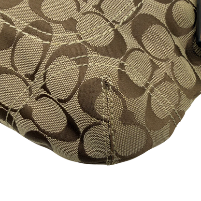 https://cdn.shopify.com/s/files/1/0564/9376/8855/files/Coach_Schultertasche_Signature_beige_6.webp?v=1782896647