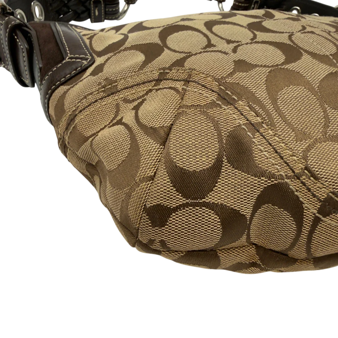 https://cdn.shopify.com/s/files/1/0564/9376/8855/files/Coach_Schultertasche_Signature_beige_6_cb75fcfa-d0cc-4980-aded-0ebcf698a996.webp?v=1782903795
