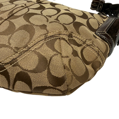 https://cdn.shopify.com/s/files/1/0564/9376/8855/files/Coach_Schultertasche_Signature_beige_7_dd32c782-e977-4cb0-8618-1eab9d30f04a.webp?v=1782903795