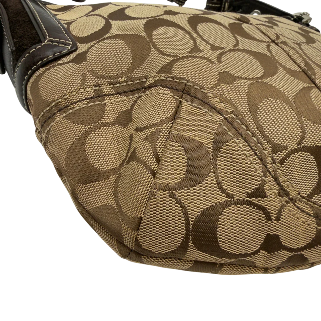 https://cdn.shopify.com/s/files/1/0564/9376/8855/files/Coach_Schultertasche_Signature_beige_8_4c3e1279-4769-4820-8e33-a2c2220051a0.webp?v=1782903794