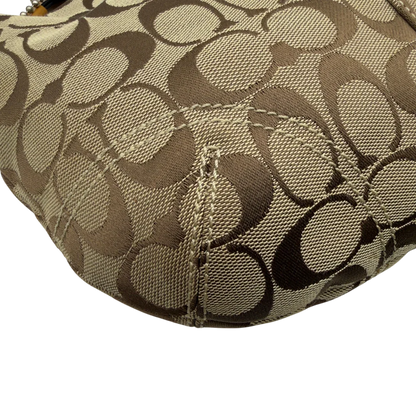 https://cdn.shopify.com/s/files/1/0564/9376/8855/files/Coach_Schultertasche_Signature_beige_9.webp?v=1782896647