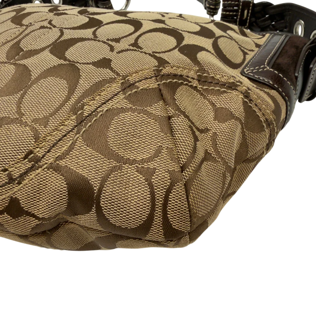 https://cdn.shopify.com/s/files/1/0564/9376/8855/files/Coach_Schultertasche_Signature_beige_9_fd7bb073-fed9-49d2-8319-9dbc2f440362.webp?v=1782903795