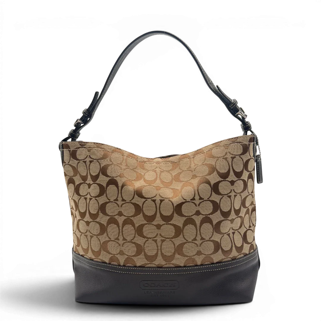 https://cdn.shopify.com/s/files/1/0564/9376/8855/files/Coach_Schultertasche_Signature_beige___braun_1.webp?v=1782312990
