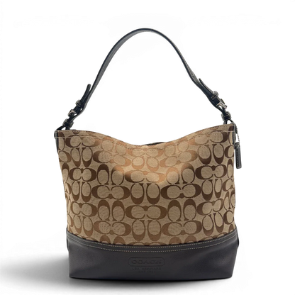 https://cdn.shopify.com/s/files/1/0564/9376/8855/files/Coach_Schultertasche_Signature_beige___braun_1.webp?v=1782312990