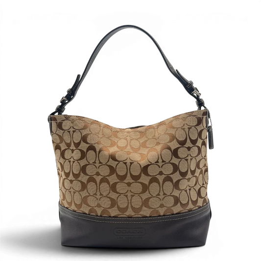https://cdn.shopify.com/s/files/1/0564/9376/8855/files/Coach_Schultertasche_Signature_beige___braun_1.webp?v=1782312990