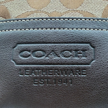 https://cdn.shopify.com/s/files/1/0564/9376/8855/files/Coach_Schultertasche_Signature_beige___braun_13.webp?v=1782312992