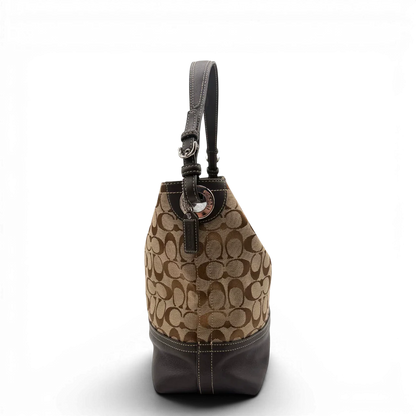https://cdn.shopify.com/s/files/1/0564/9376/8855/files/Coach_Schultertasche_Signature_beige___braun_3.webp?v=1782312990