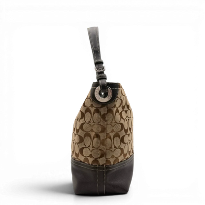https://cdn.shopify.com/s/files/1/0564/9376/8855/files/Coach_Schultertasche_Signature_beige___braun_4.webp?v=1782312990