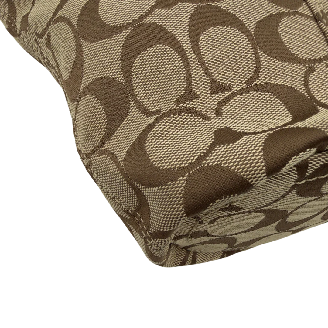 https://cdn.shopify.com/s/files/1/0564/9376/8855/files/Coach_Schultertasche_Signature_beige___schwarz_7.webp?v=1782910164