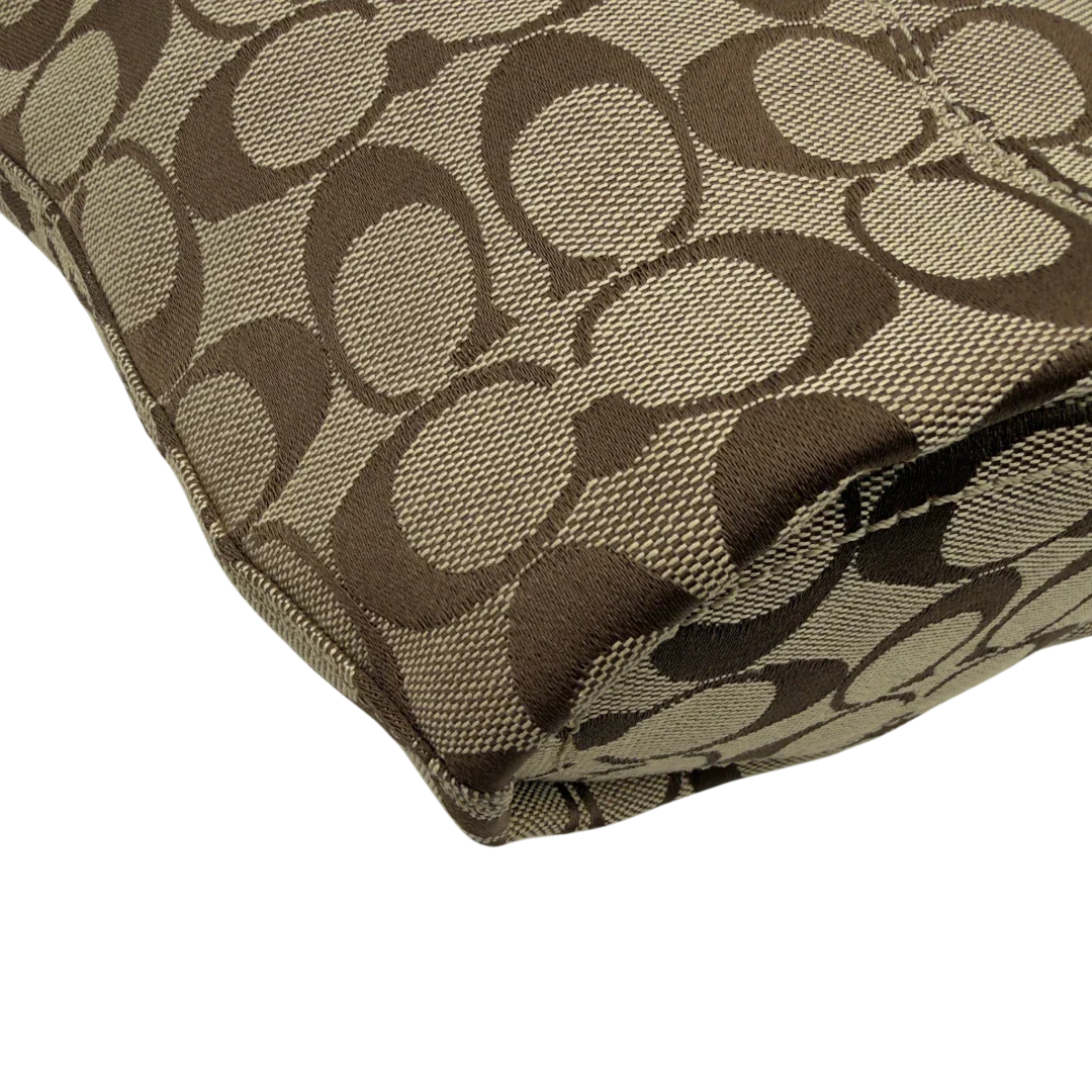 https://cdn.shopify.com/s/files/1/0564/9376/8855/files/Coach_Schultertasche_Signature_beige___schwarz_9.webp?v=1782910164
