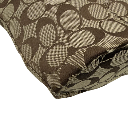 https://cdn.shopify.com/s/files/1/0564/9376/8855/files/Coach_Schultertasche_Signature_beige___schwarz_9.webp?v=1782910164