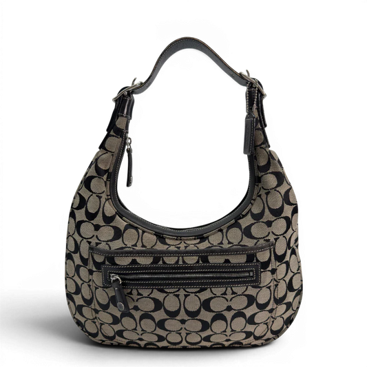 https://cdn.shopify.com/s/files/1/0564/9376/8855/files/Coach_Schultertasche_Signature_beige___schwarz_vintage8705.webp?v=1781084794