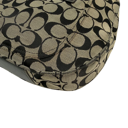 https://cdn.shopify.com/s/files/1/0564/9376/8855/files/Coach_Schultertasche_Signature_beige___schwarz_vintage8710.webp?v=1781084794