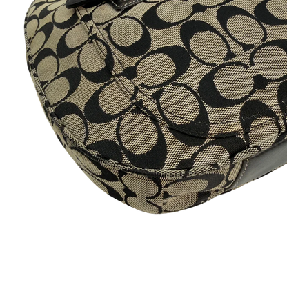 https://cdn.shopify.com/s/files/1/0564/9376/8855/files/Coach_Schultertasche_Signature_beige___schwarz_vintage8711.webp?v=1781084794