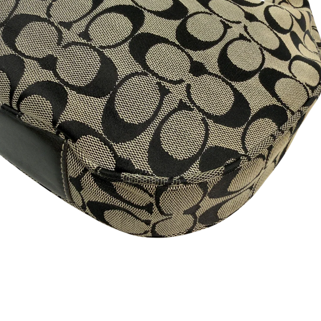 https://cdn.shopify.com/s/files/1/0564/9376/8855/files/Coach_Schultertasche_Signature_beige___schwarz_vintage8712.webp?v=1781084794