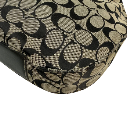 https://cdn.shopify.com/s/files/1/0564/9376/8855/files/Coach_Schultertasche_Signature_beige___schwarz_vintage8712.webp?v=1781084794