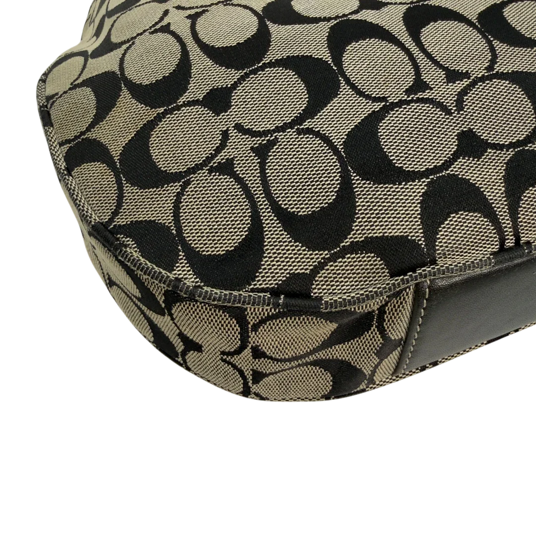 https://cdn.shopify.com/s/files/1/0564/9376/8855/files/Coach_Schultertasche_Signature_beige___schwarz_vintage8713.webp?v=1781084794