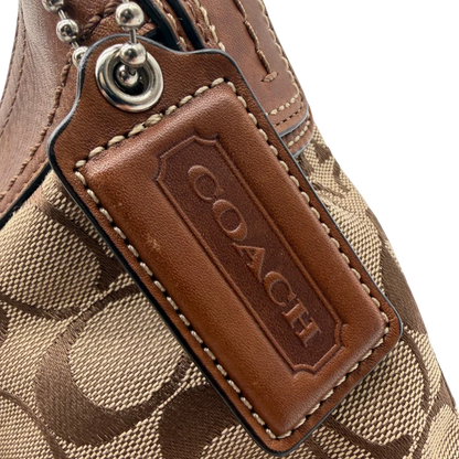 https://cdn.shopify.com/s/files/1/0564/9376/8855/files/Coach_Schultertasche_Signature_large_beige___braun_10.webp?v=1782312708