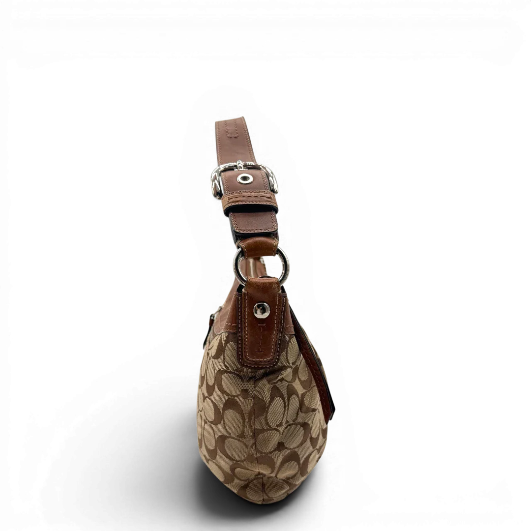 https://cdn.shopify.com/s/files/1/0564/9376/8855/files/Coach_Schultertasche_Signature_large_beige___braun_4.webp?v=1782312708