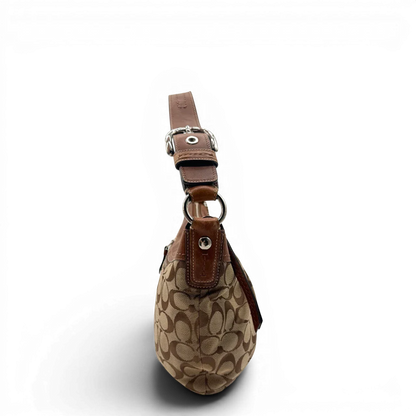 https://cdn.shopify.com/s/files/1/0564/9376/8855/files/Coach_Schultertasche_Signature_large_beige___braun_4.webp?v=1782312708