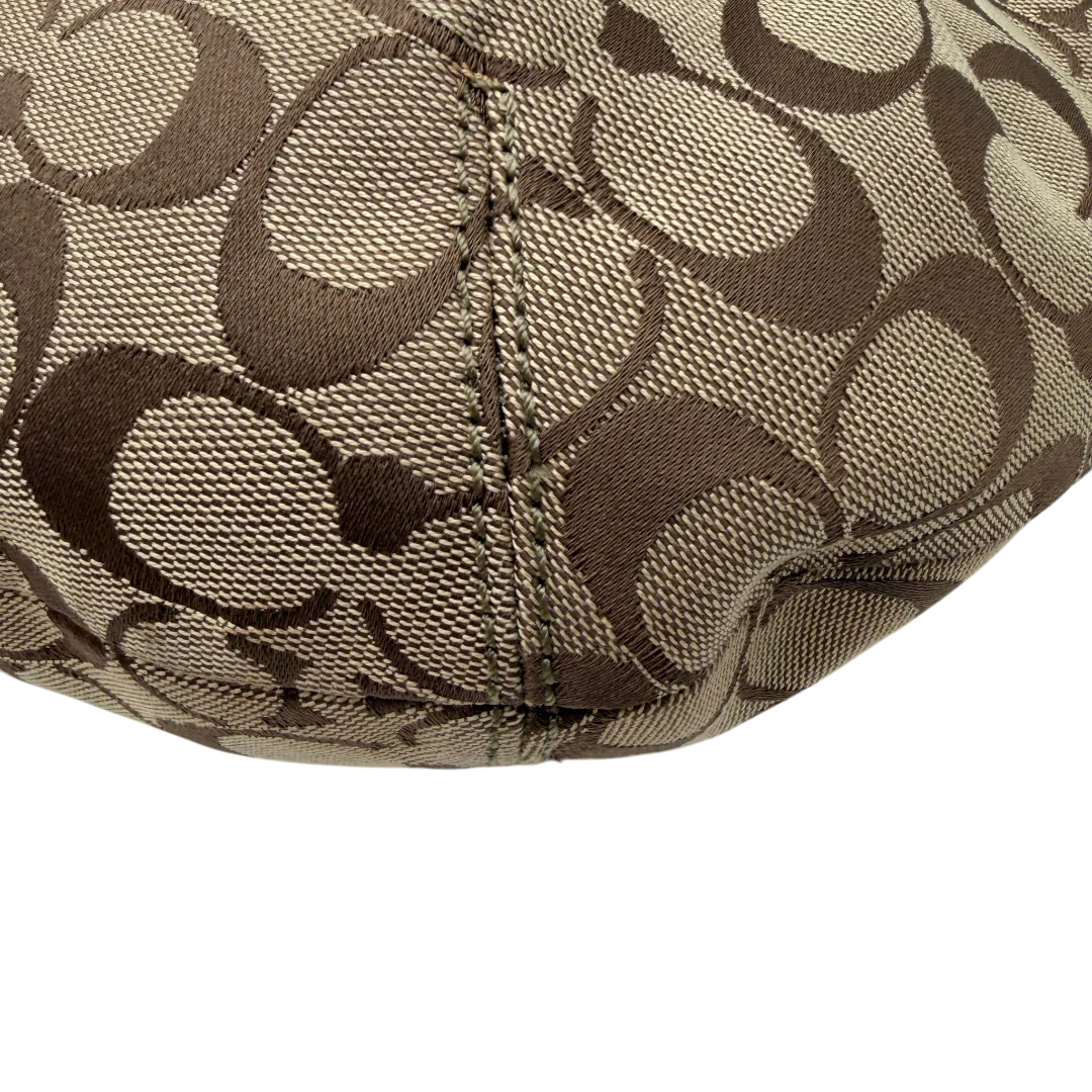 https://cdn.shopify.com/s/files/1/0564/9376/8855/files/Coach_Schultertasche_Signature_large_beige___braun_5.webp?v=1782312708