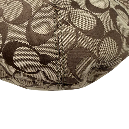 https://cdn.shopify.com/s/files/1/0564/9376/8855/files/Coach_Schultertasche_Signature_large_beige___braun_5.webp?v=1782312708