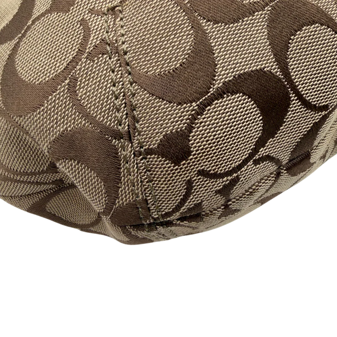 https://cdn.shopify.com/s/files/1/0564/9376/8855/files/Coach_Schultertasche_Signature_large_beige___braun_6.webp?v=1782312708