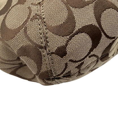 https://cdn.shopify.com/s/files/1/0564/9376/8855/files/Coach_Schultertasche_Signature_large_beige___braun_6.webp?v=1782312708