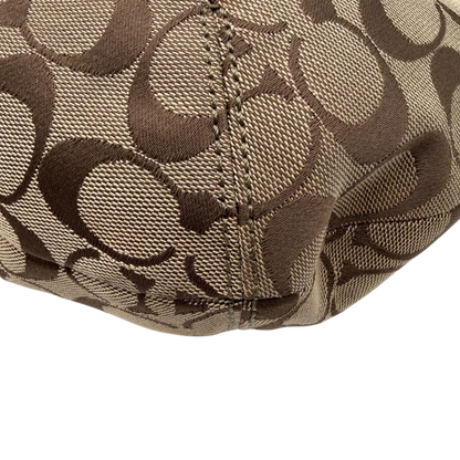 https://cdn.shopify.com/s/files/1/0564/9376/8855/files/Coach_Schultertasche_Signature_large_beige___braun_7.webp?v=1782312708