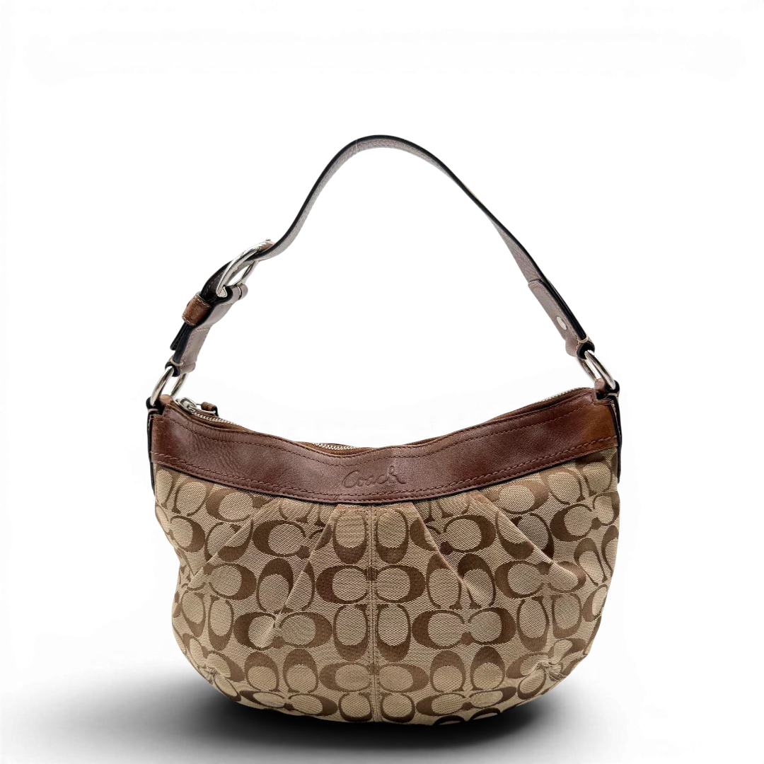 https://cdn.shopify.com/s/files/1/0564/9376/8855/files/Coach_Schultertasche_Signature_large_beige___braun_vintage8032.webp?v=1780489159