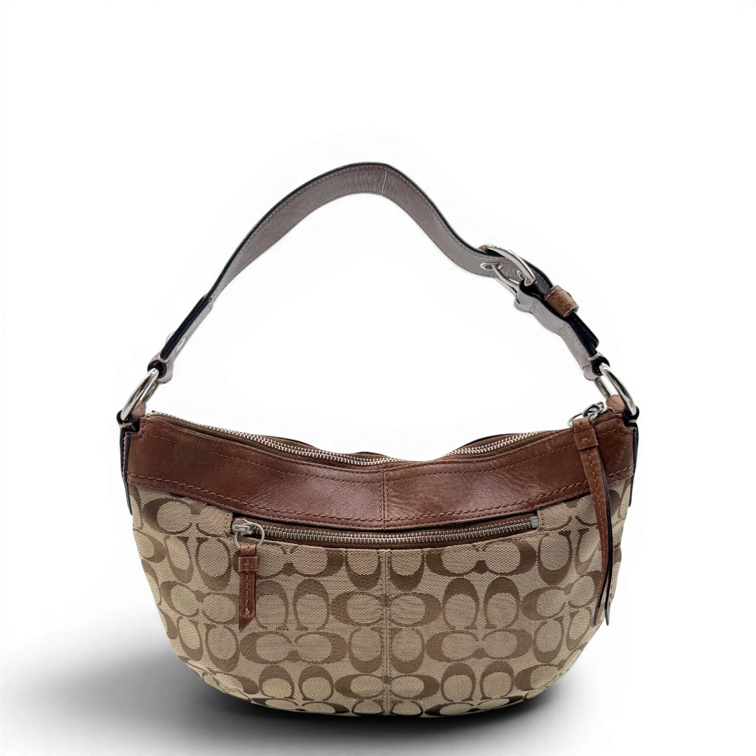 https://cdn.shopify.com/s/files/1/0564/9376/8855/files/Coach_Schultertasche_Signature_large_beige___braun_vintage8033.webp?v=1780489159