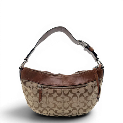 https://cdn.shopify.com/s/files/1/0564/9376/8855/files/Coach_Schultertasche_Signature_large_beige___braun_vintage8033.webp?v=1780489159