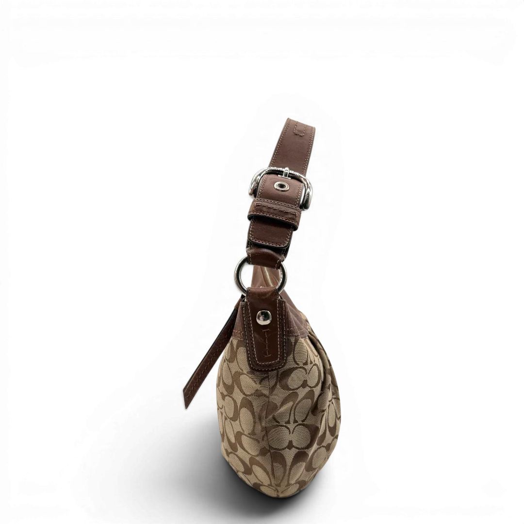 https://cdn.shopify.com/s/files/1/0564/9376/8855/files/Coach_Schultertasche_Signature_large_beige___braun_vintage8036.webp?v=1780489159