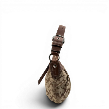 https://cdn.shopify.com/s/files/1/0564/9376/8855/files/Coach_Schultertasche_Signature_large_beige___braun_vintage8036.webp?v=1780489159