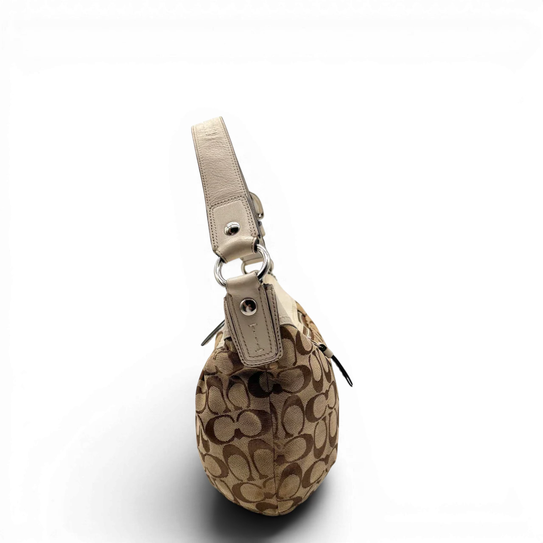 https://cdn.shopify.com/s/files/1/0564/9376/8855/files/Coach_Schultertasche_Signature_large_beige___weiss_vintage7991.webp?v=1780489240