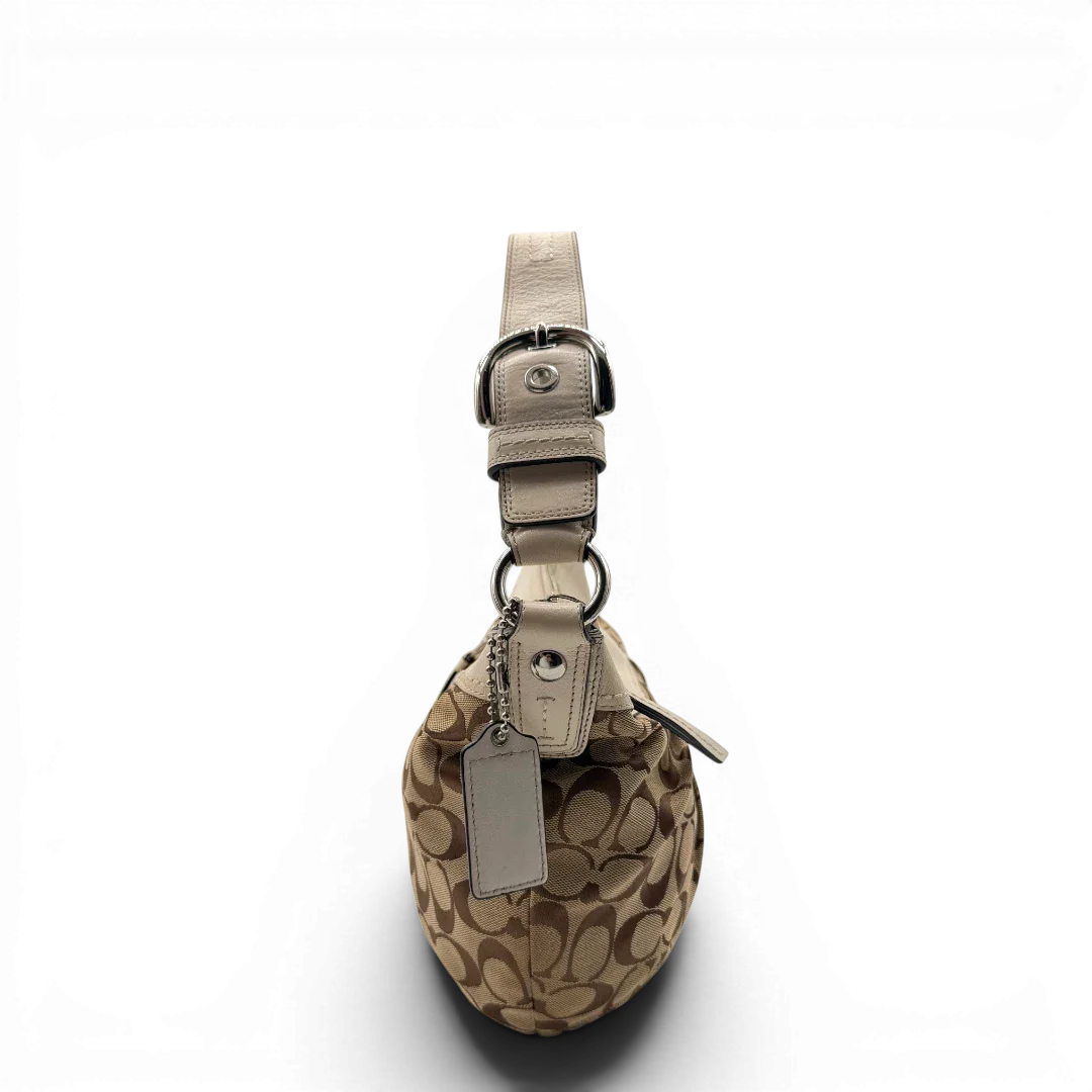 https://cdn.shopify.com/s/files/1/0564/9376/8855/files/Coach_Schultertasche_Signature_large_beige___weiss_vintage7992.webp?v=1780489240