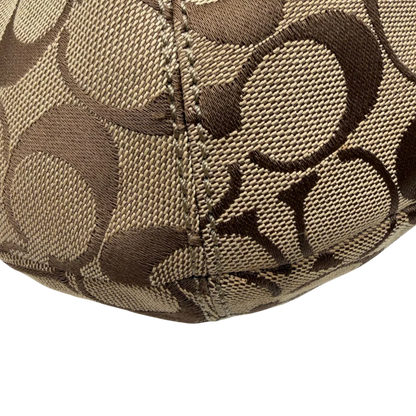 https://cdn.shopify.com/s/files/1/0564/9376/8855/files/Coach_Schultertasche_Signature_large_beige___weiss_vintage7995.webp?v=1780489241