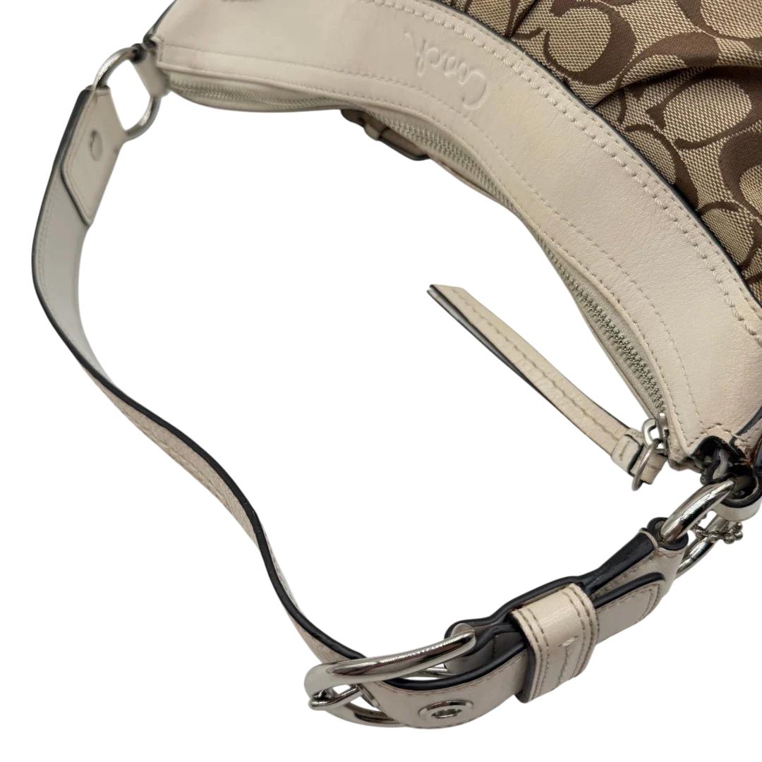 https://cdn.shopify.com/s/files/1/0564/9376/8855/files/Coach_Schultertasche_Signature_large_beige___weiss_vintage7998.webp?v=1780489241
