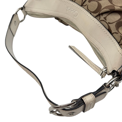 https://cdn.shopify.com/s/files/1/0564/9376/8855/files/Coach_Schultertasche_Signature_large_beige___weiss_vintage7998.webp?v=1780489241