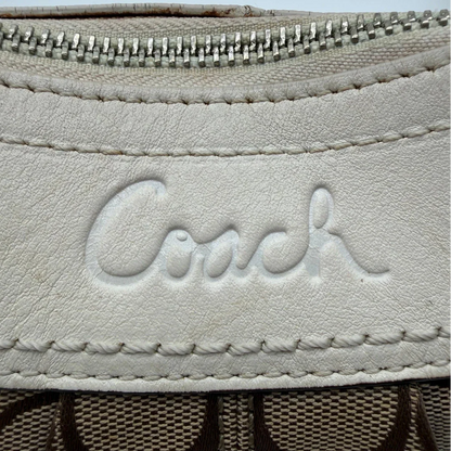 https://cdn.shopify.com/s/files/1/0564/9376/8855/files/Coach_Schultertasche_Signature_large_beige___weiss_vintage7999.webp?v=1780489241