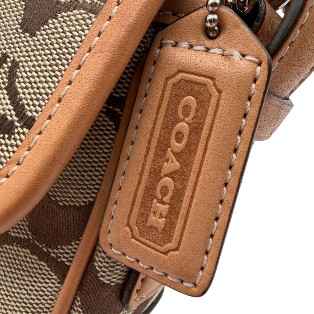 https://cdn.shopify.com/s/files/1/0564/9376/8855/files/Coach_Schultertasche_Soho_Signature_Square_bag_beige_12.webp?v=1782312488
