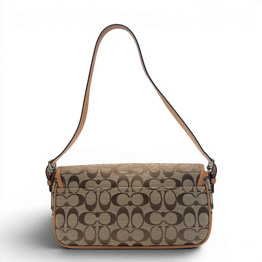 https://cdn.shopify.com/s/files/1/0564/9376/8855/files/Coach_Schultertasche_Soho_Signature_Square_bag_beige_2.webp?v=1782312487