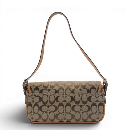 https://cdn.shopify.com/s/files/1/0564/9376/8855/files/Coach_Schultertasche_Soho_Signature_Square_bag_beige_2.webp?v=1782312487
