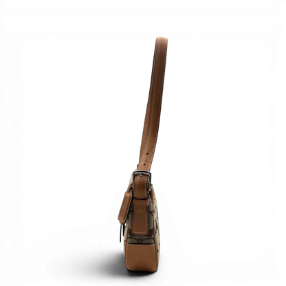 https://cdn.shopify.com/s/files/1/0564/9376/8855/files/Coach_Schultertasche_Soho_Signature_Square_bag_beige_3.webp?v=1782312486