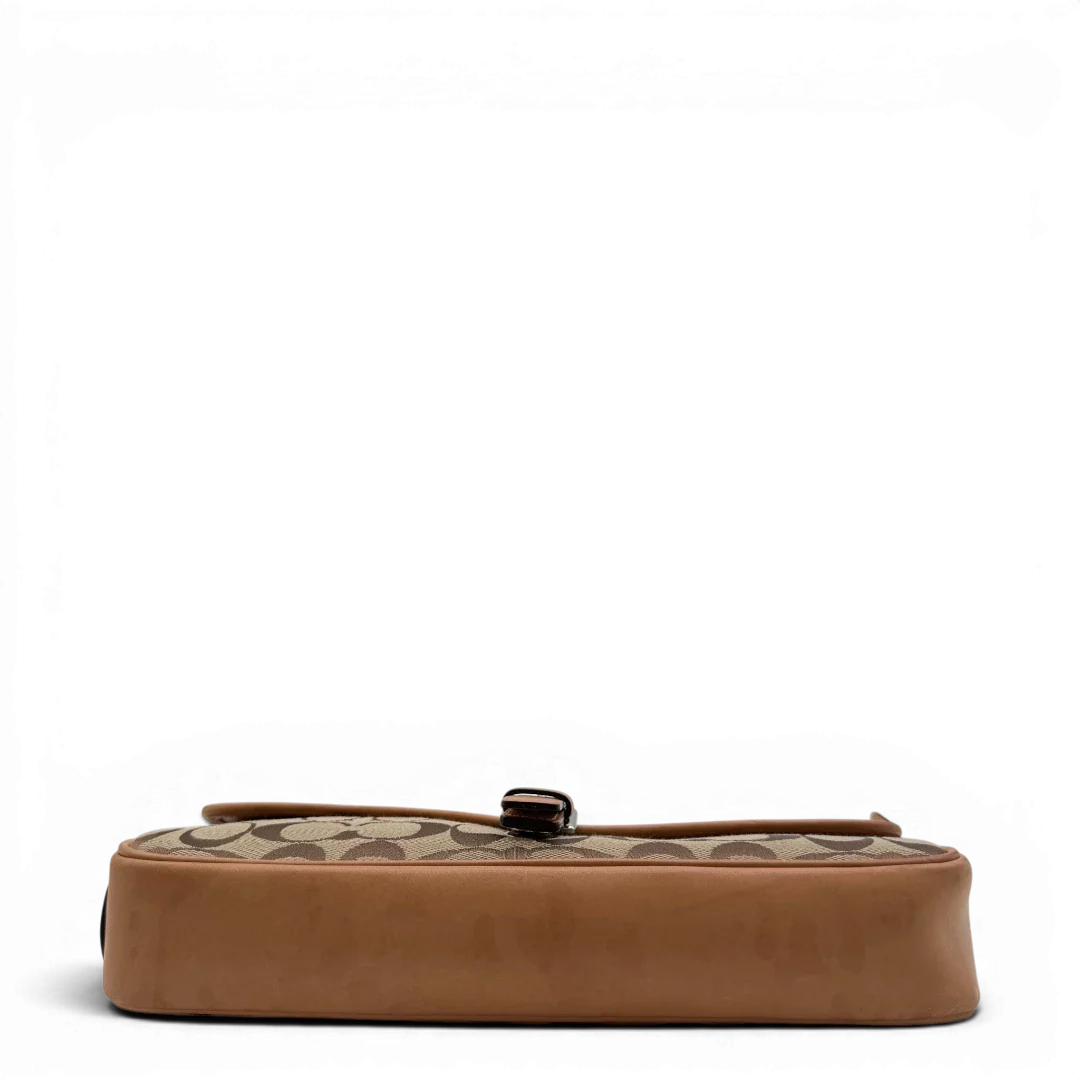 https://cdn.shopify.com/s/files/1/0564/9376/8855/files/Coach_Schultertasche_Soho_Signature_Square_bag_beige_5.webp?v=1782312486