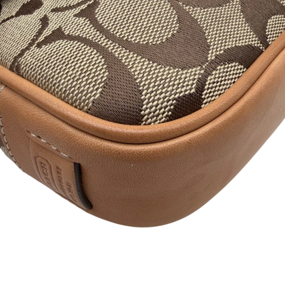 https://cdn.shopify.com/s/files/1/0564/9376/8855/files/Coach_Schultertasche_Soho_Signature_Square_bag_beige_7.webp?v=1782312487