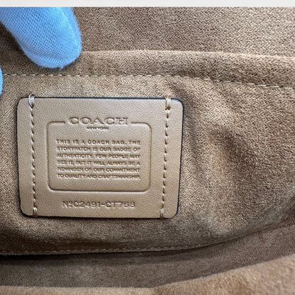 https://cdn.shopify.com/s/files/1/0564/9376/8855/files/Coach_Schultertasche_aus_Leder_braun_shoulder_bag9480.webp?v=1761265935