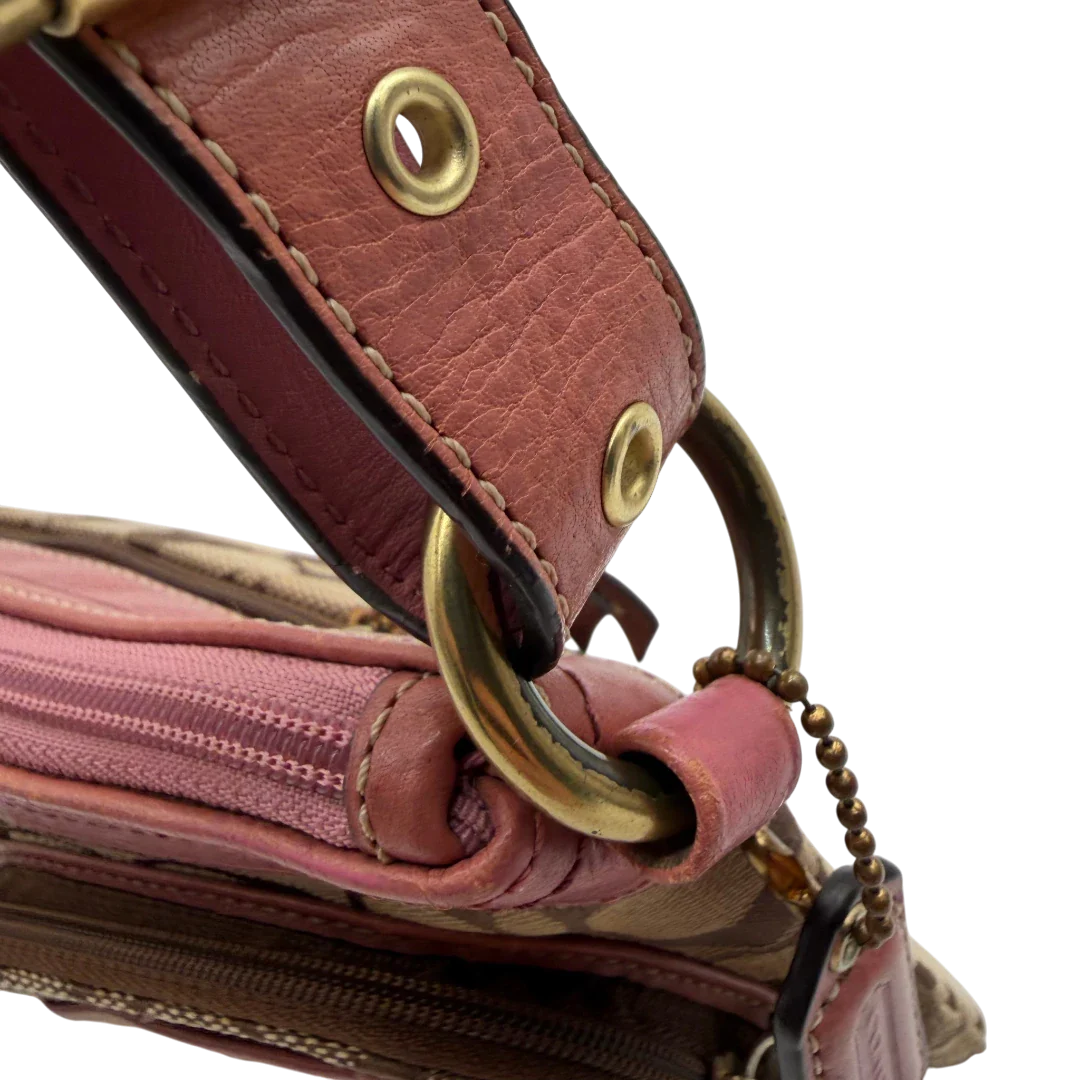 https://cdn.shopify.com/s/files/1/0564/9376/8855/files/Coach_Schultertasche_mit_zwei_Taschen_Signature_beige_vintage8027.webp?v=1780489439