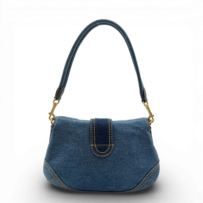 https://cdn.shopify.com/s/files/1/0564/9376/8855/files/Coach_Soho_Flap_Bag_Repurposed_Denim_vintage2496.webp?v=1773326402